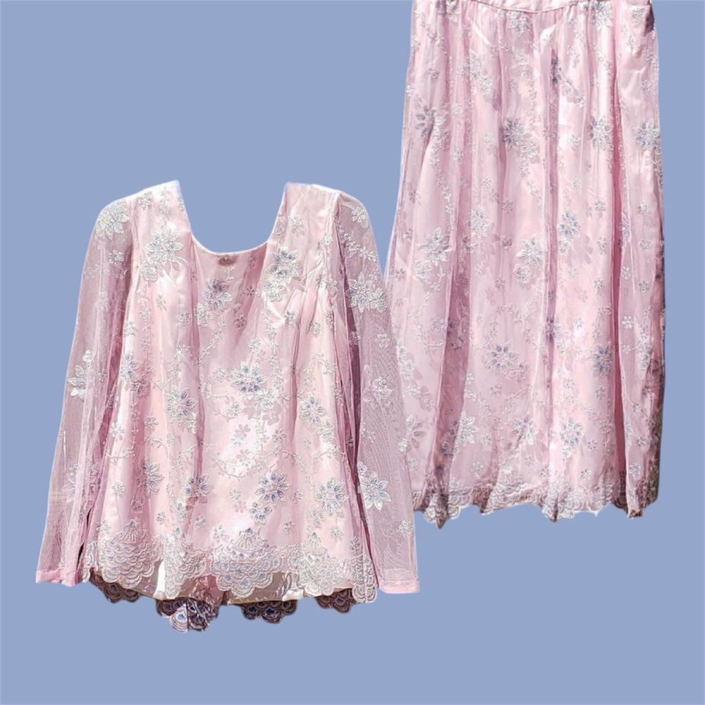Pink floral print skirt and top set.